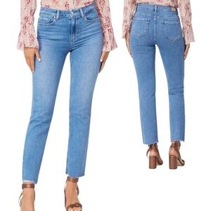 PAIGE Light Blue Flared Jeans with Distressed Hem